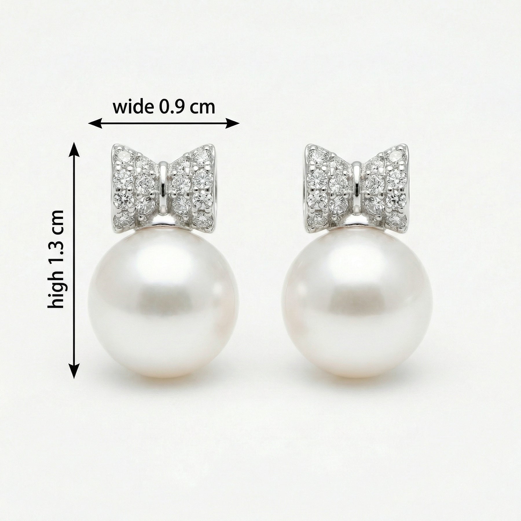 Pearl Bow Stud Earrings – pearl earrings, close-up