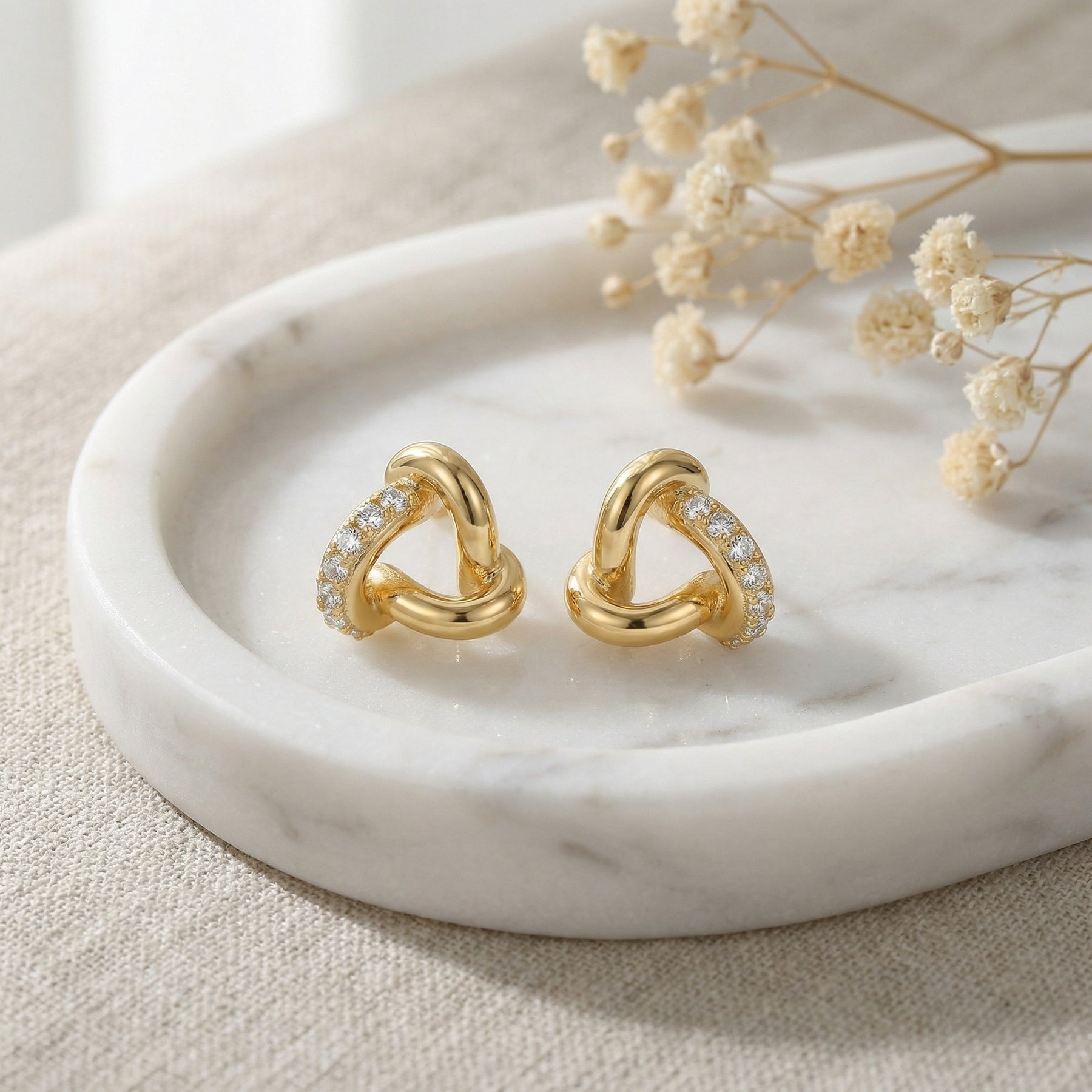 Interlocking Three-Loop Knot Studs – sterling silver earrings, front view