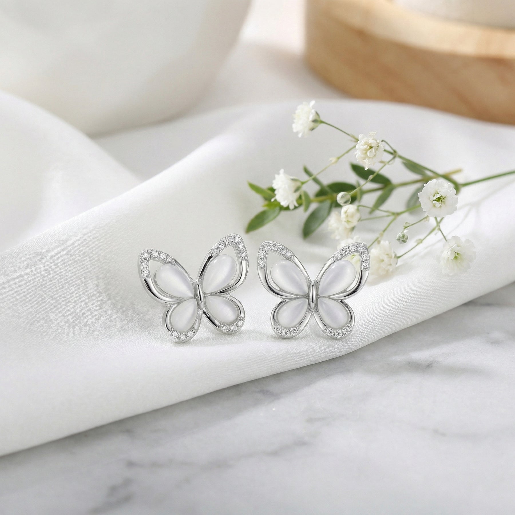 Mother-of-Pearl Butterfly Studs – mother-of-pearl earrings, close-up