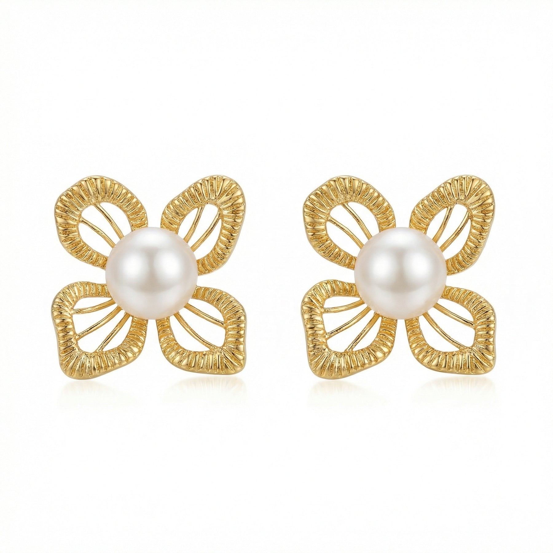 Pearl and Textured Floral Studs – pearl earrings, close-up