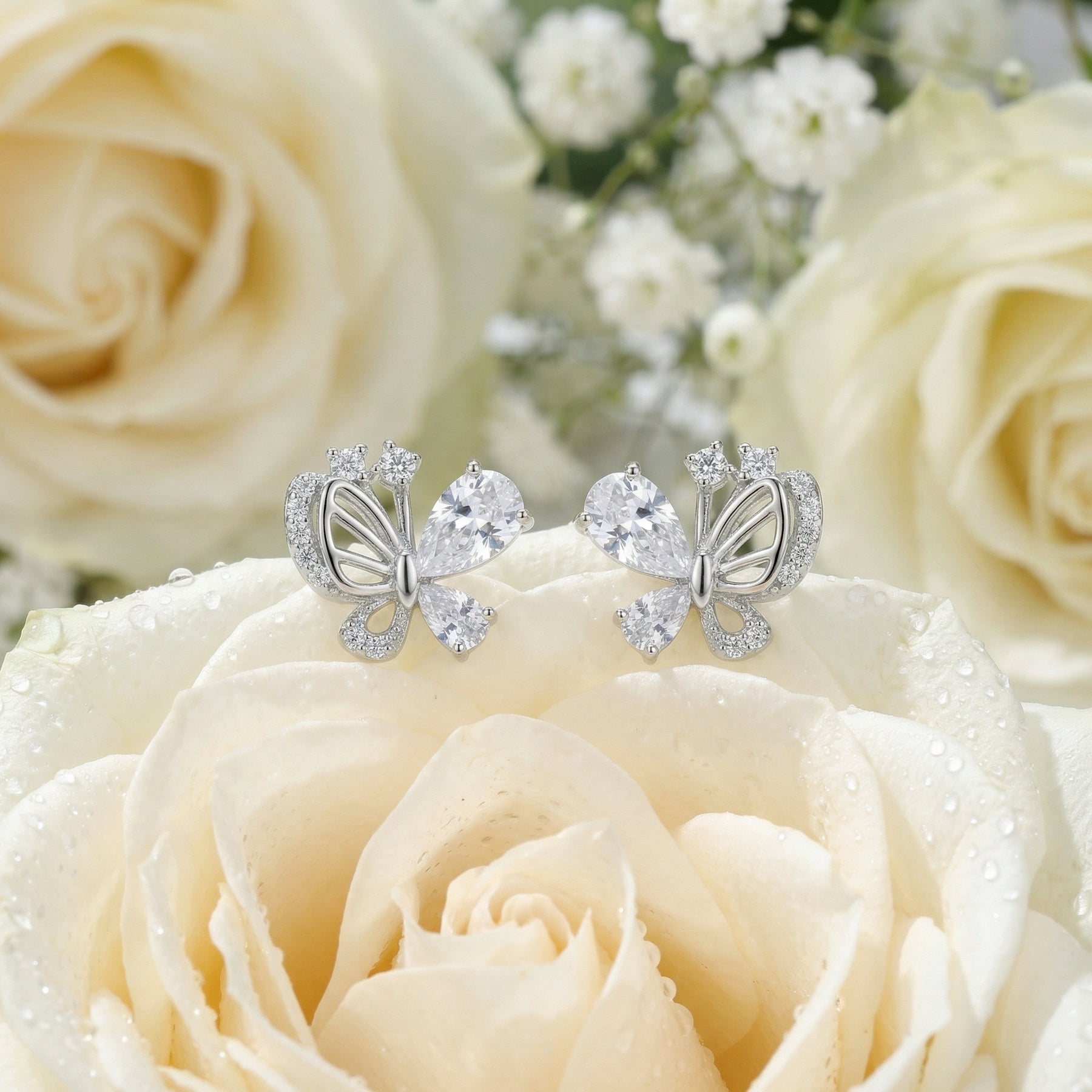 Silver Butterfly Studs with Pear CZ – sterling silver earrings, side detail