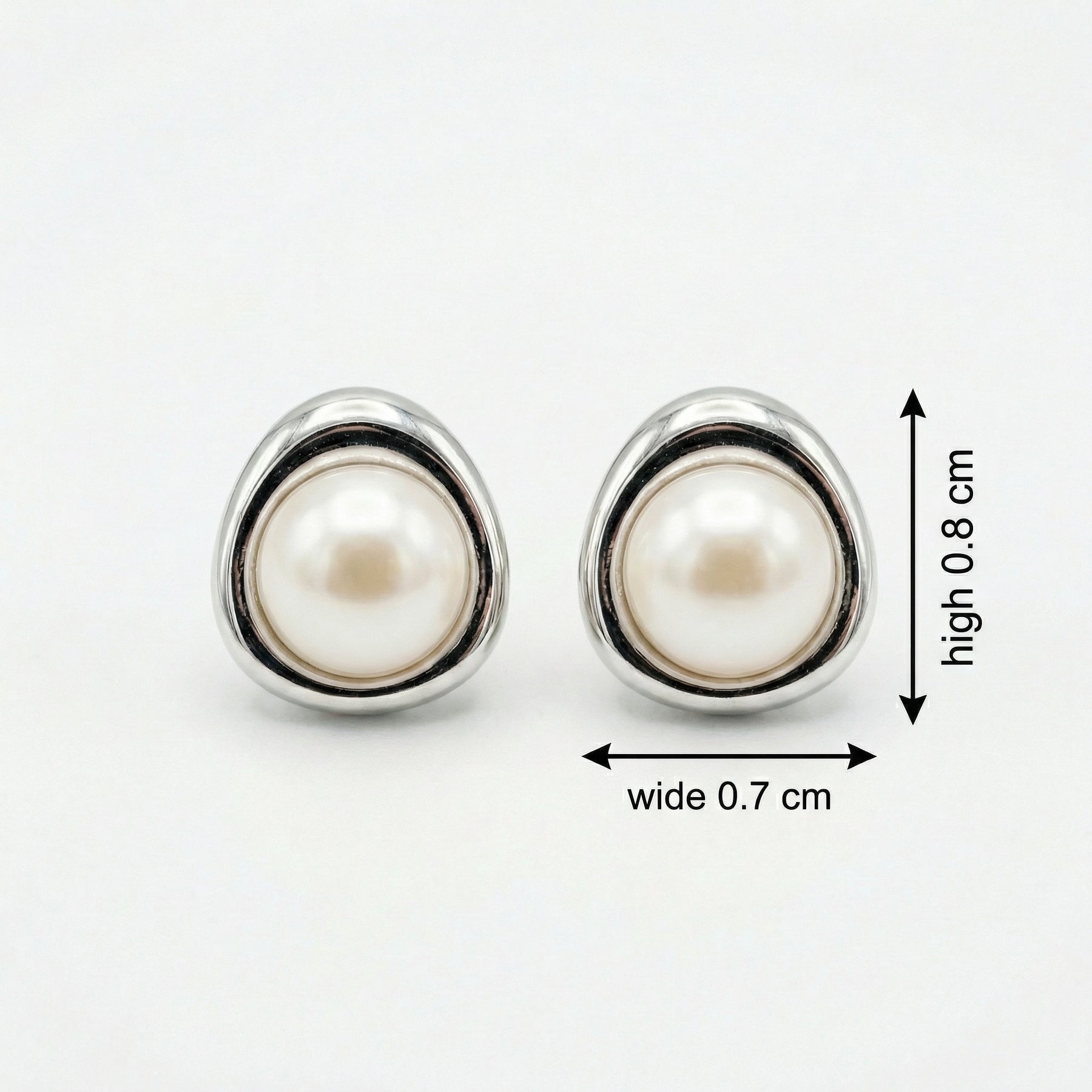 Pearl Studs in Triangular Settings – pearl earrings, front view