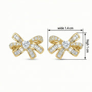 Bow Studs with Heart Center – sterling silver earrings, close-up