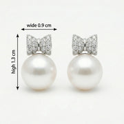 Pearl Bow Stud Earrings – pearl earrings, close-up