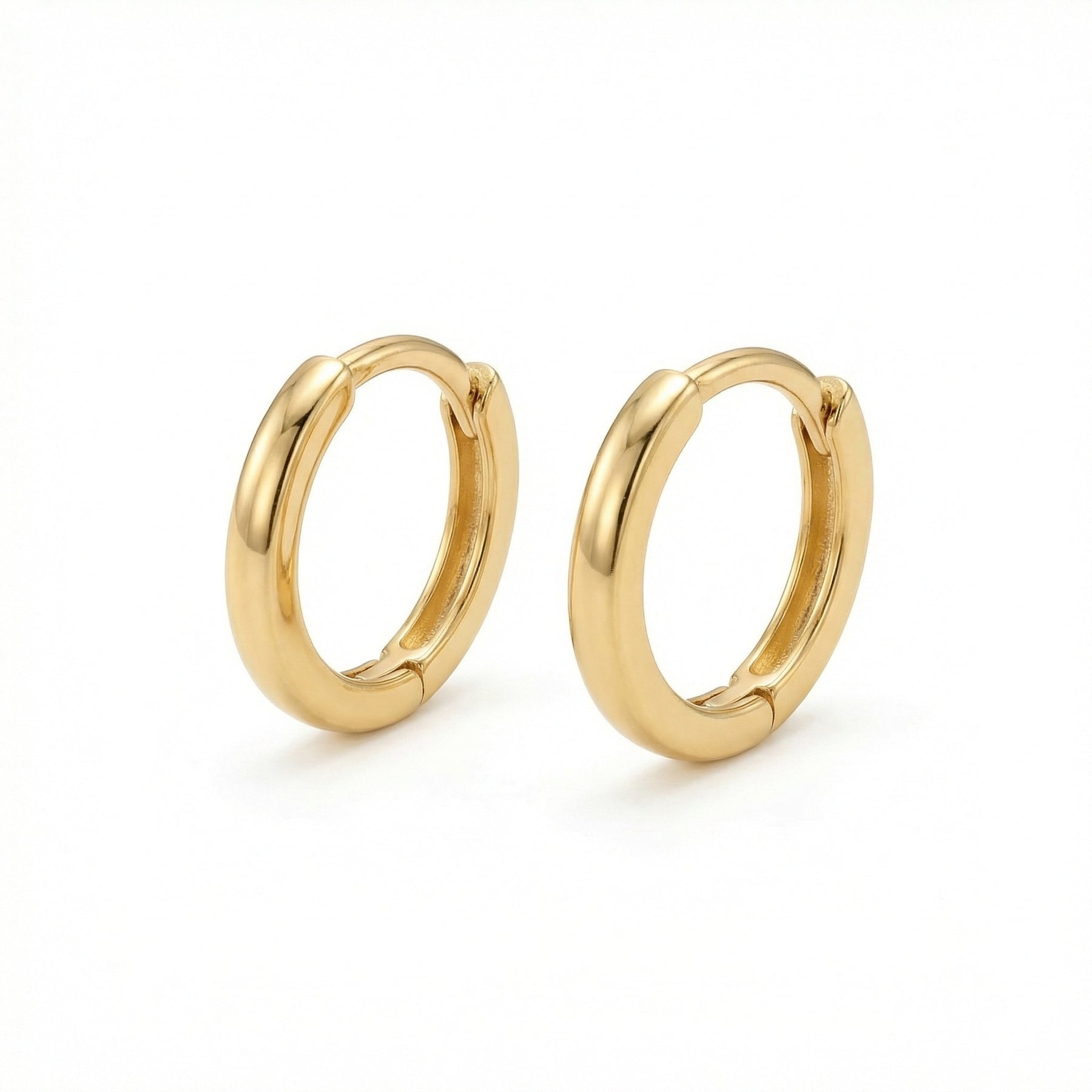 Polished Minimalist Huggie Hoops – sterling silver earrings, close-up
