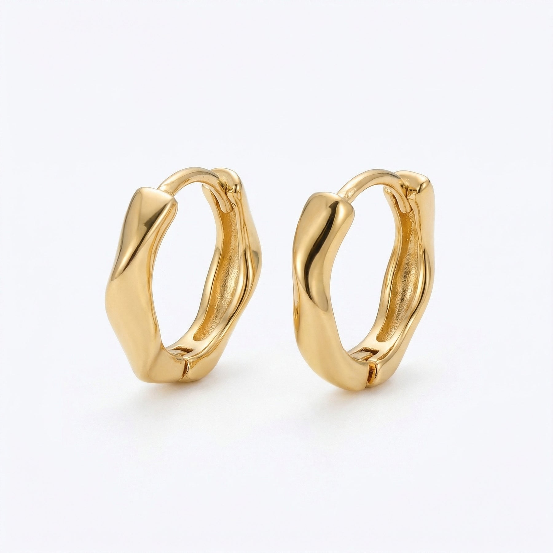 Wavy Organic Huggie Earrings – sterling silver earrings, front view