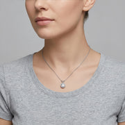 Solitaire Halo Pendant Necklace – sterling silver necklace, front view