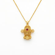 Filigree Fish Pendant with Ruby Accent – ruby necklace, close-up