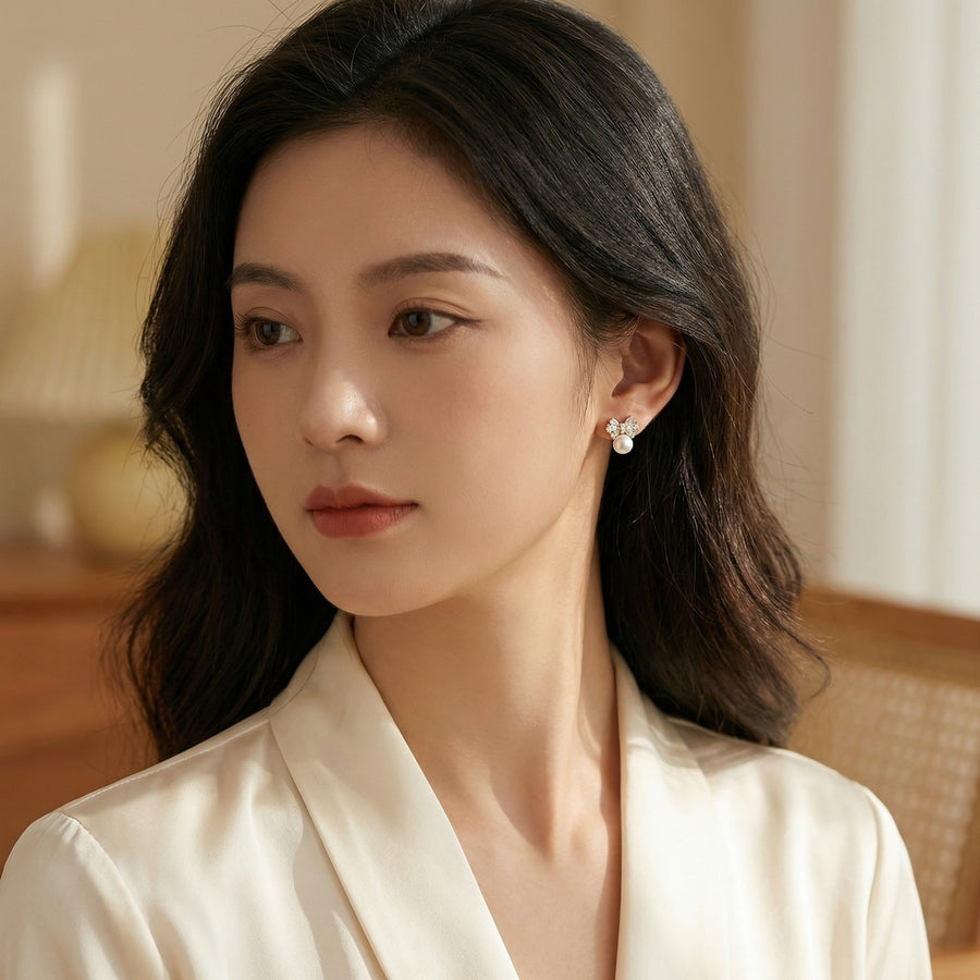 Bow-Shaped Pearl Stud Earrings – pearl earrings, close-up