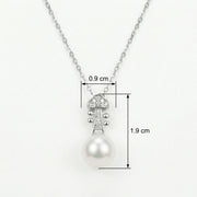 Violin Scroll Pearl Necklace – pearl necklace, front view