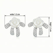 Mother-of-Pearl Bow Crystal Studs – mother-of-pearl earrings, close-up