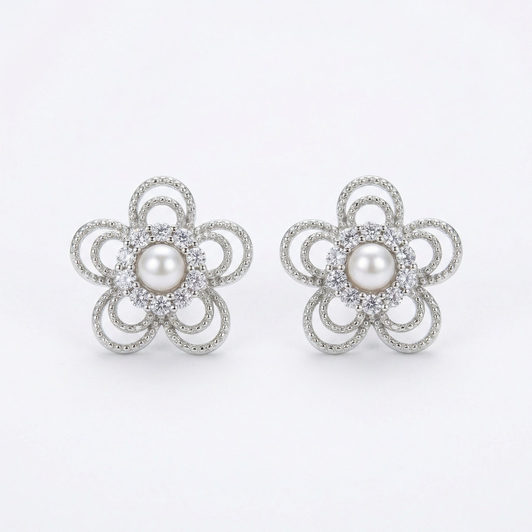 Open-Work Flower Pearl Stud Earrings – pearl earrings, close-up