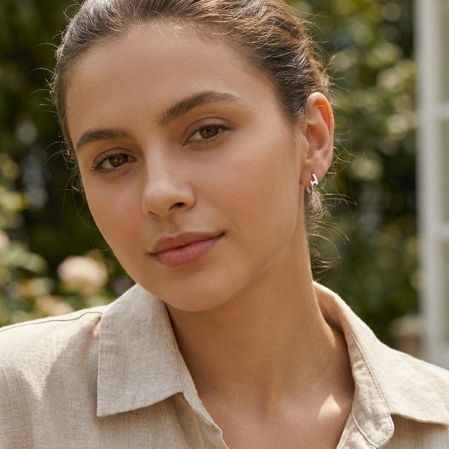 Lightning Bolt Huggie Hoop Earrings – sterling silver earrings, front view