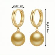 Honey-Toned Pearl Drop Huggie Earrings – pearl earrings, front view