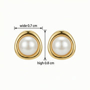 Pearl Studs in Sculptural Gilded Setting – pearl earrings, front view