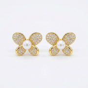 Butterfly Studs, Pearl Center – pearl earrings, close-up