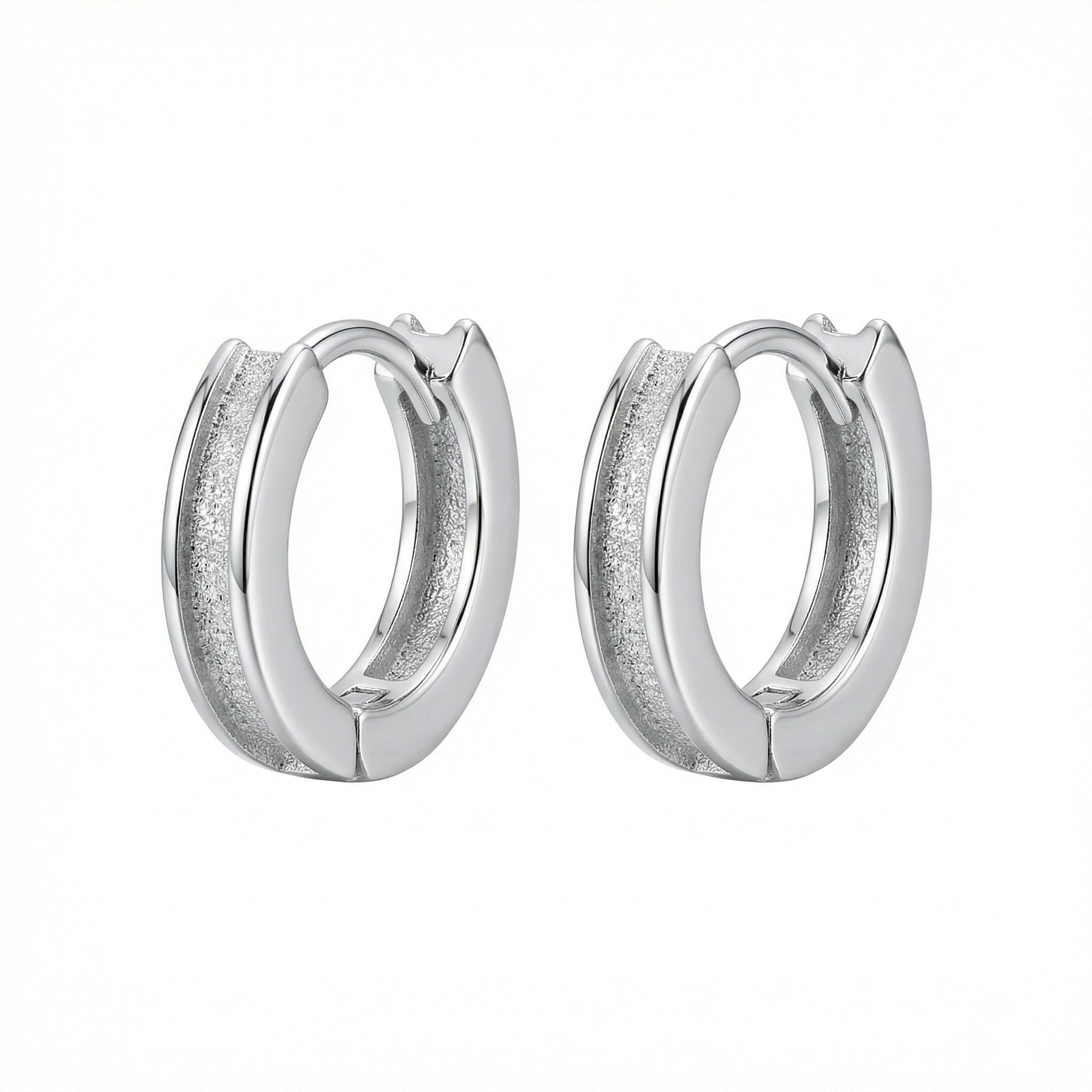 Textured Huggie Hoops, Polished Borders – sterling silver earrings, close-up