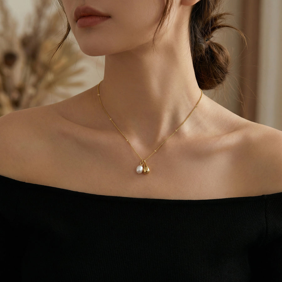 Dual Drop Necklace, Pearl and Charm – pearl necklace, close-up