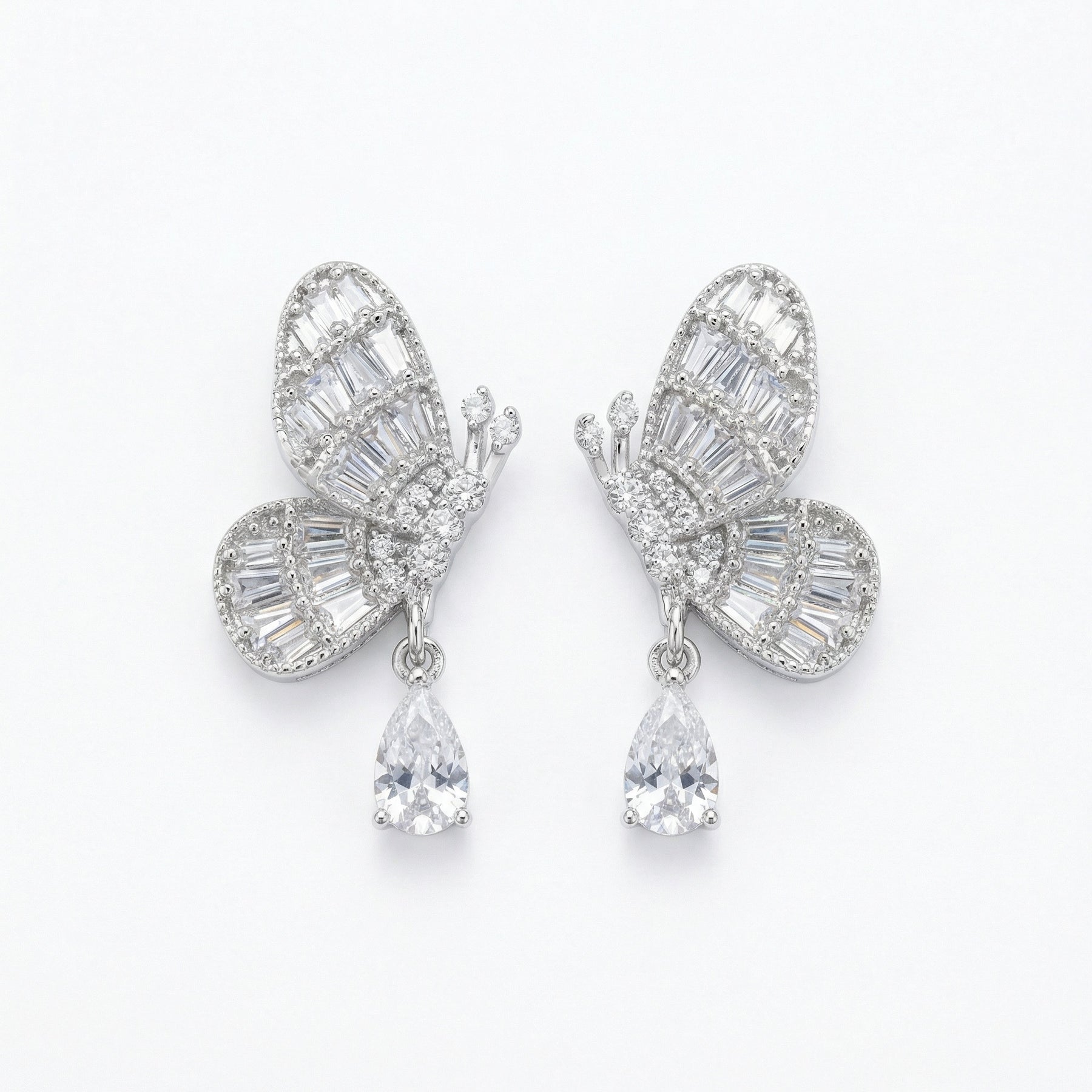 Butterfly Drop Earrings, Baguette and Pear – sterling silver earrings, close-up