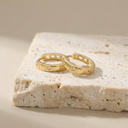 Textured Geometric Huggie Hoops – sterling silver earrings, front view