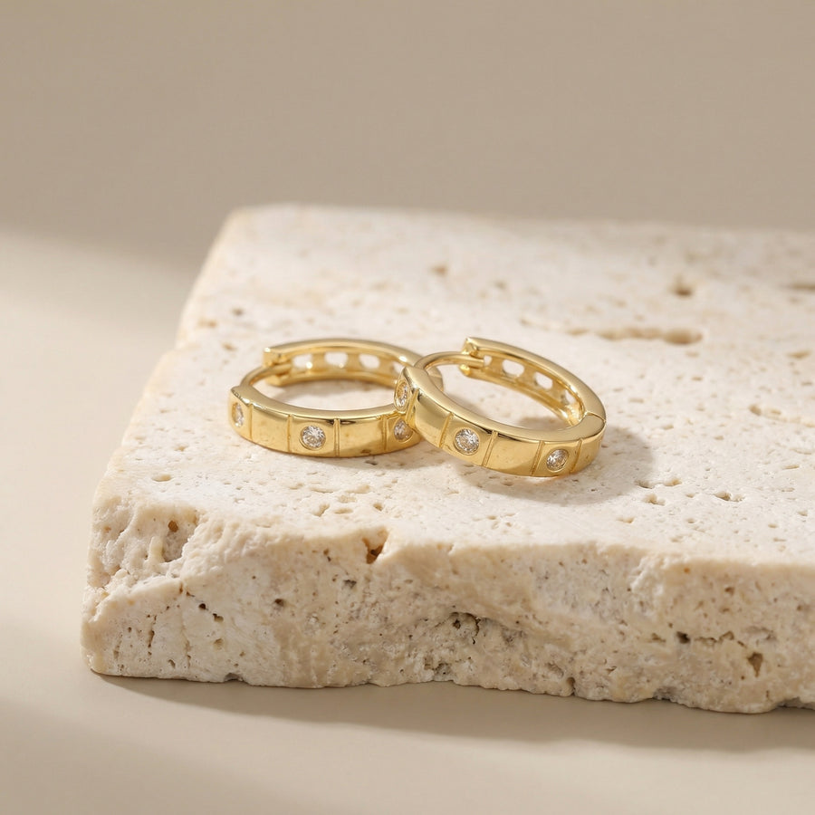 Textured Geometric Huggie Hoops – sterling silver earrings, front view