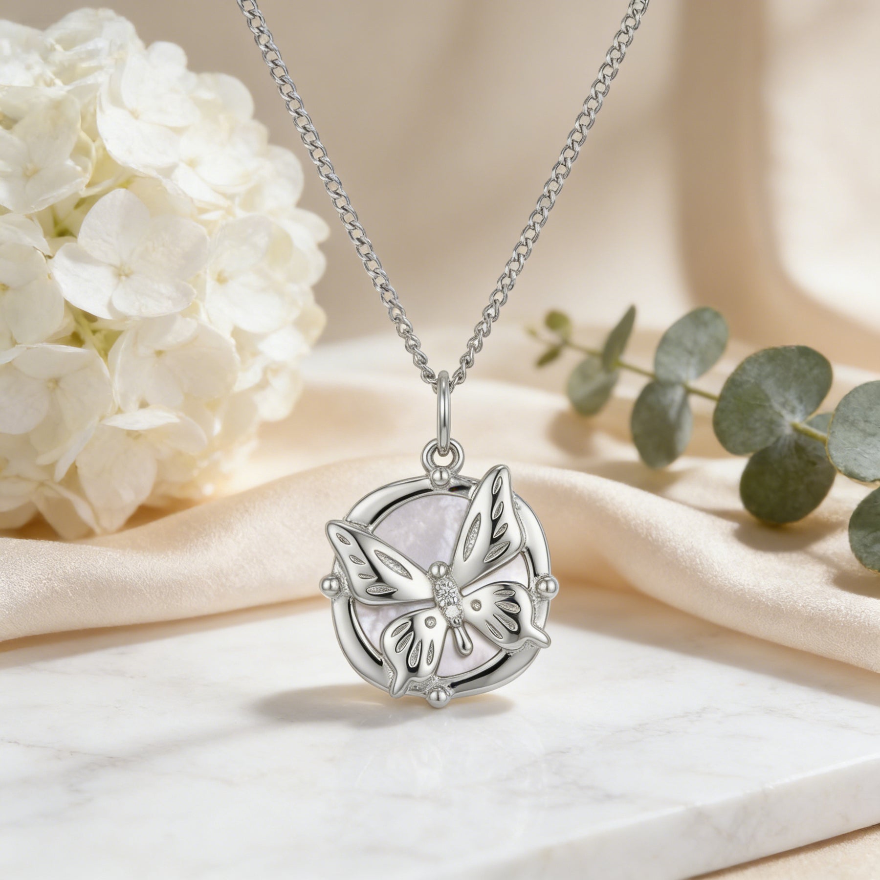 Butterfly Pendant in Circular Frame – sterling silver necklace, close-up
