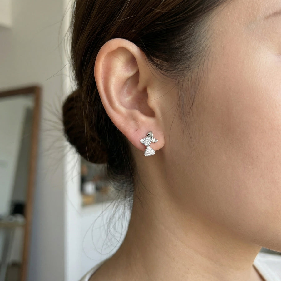 Abstract Butterfly Ribbon Studs – sterling silver earrings, close-up