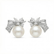 White Pearl Bow Stud Earrings – pearl earrings, close-up