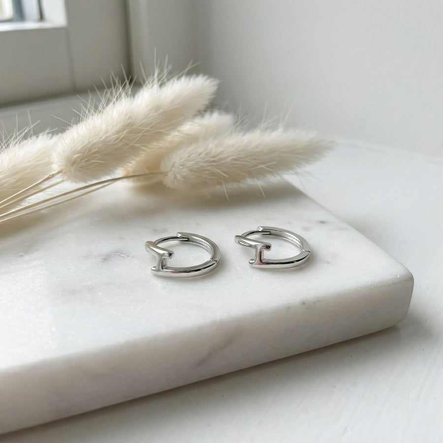 Lightning Bolt Huggie Hoop Earrings – sterling silver earrings, close-up