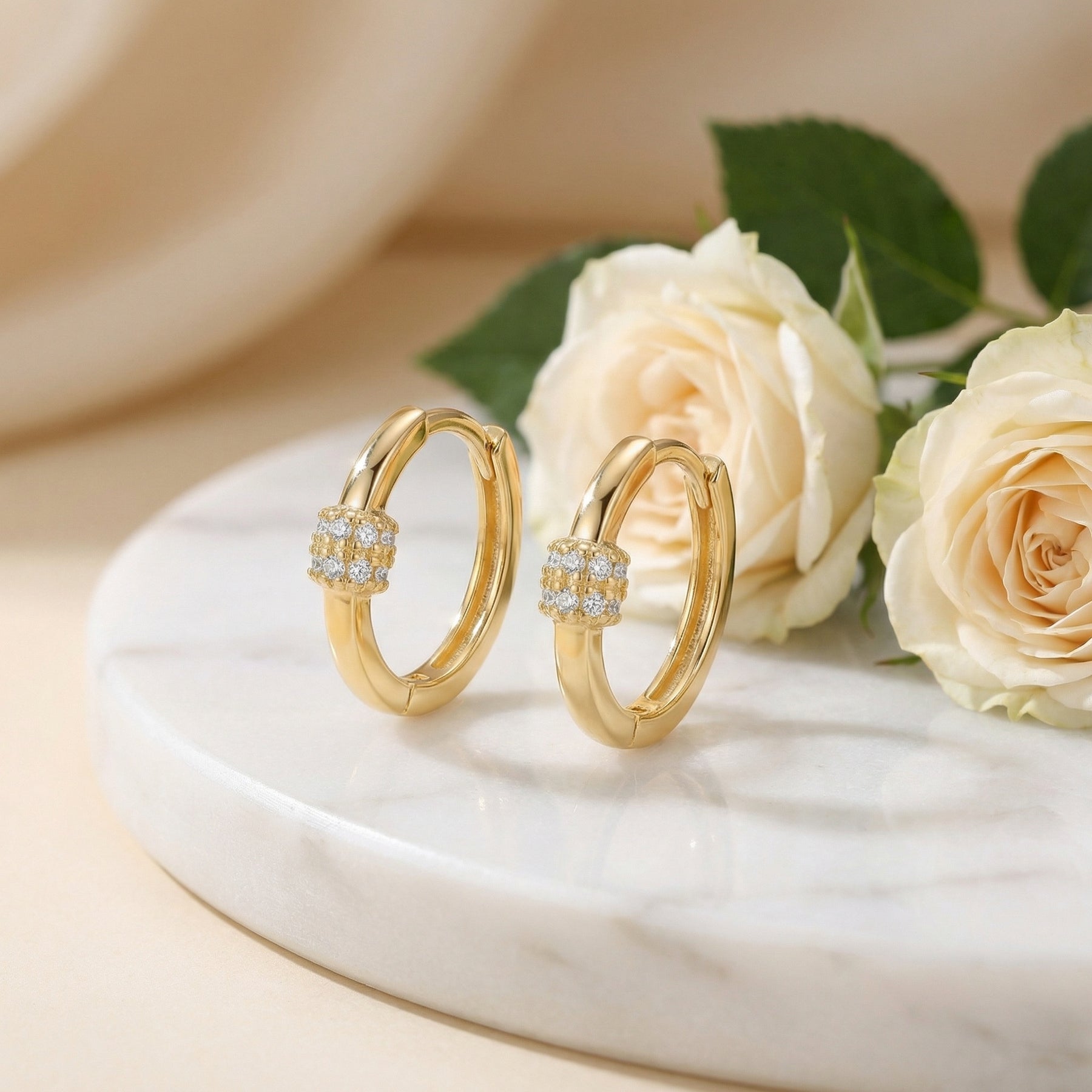 Huggie Hoops with Stone Center Detail – sterling silver earrings, close-up