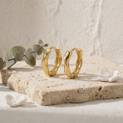 Wavy Organic Huggie Earrings – sterling silver earrings, side detail