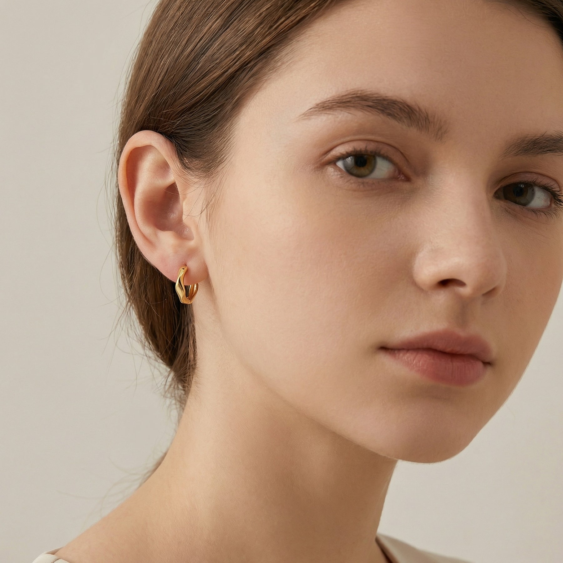 Wavy Organic Huggie Earrings – sterling silver earrings, close-up