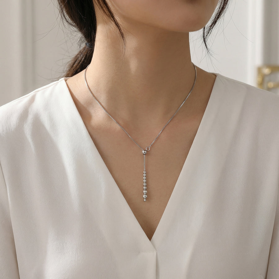 Graduated Bead Lariat Necklace – sterling silver necklace, side detail