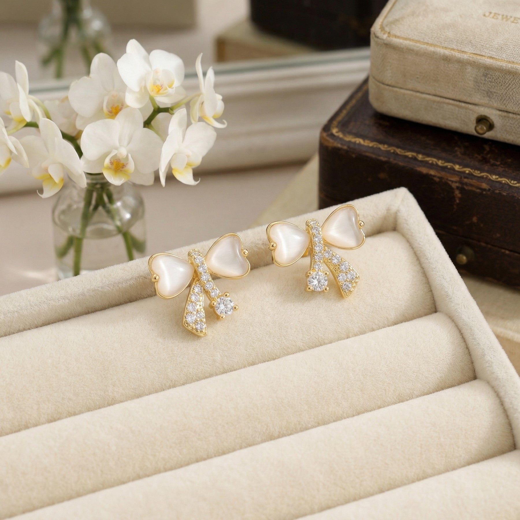 Bowknot Studs with Opal Hearts – opal earrings, side detail
