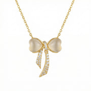 Bow Pendant Necklace, Warm Gold Tone – sterling silver necklace, side detail