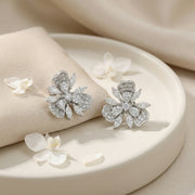 Three-Petal Floral Bloom Stud Earrings – sterling silver earrings, close-up