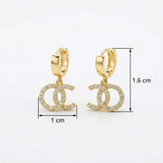 Double C Dangle Huggie Hoops – sterling silver earrings, side detail