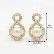 Pearl Infinity Figure-Eight Studs – pearl earrings, close-up