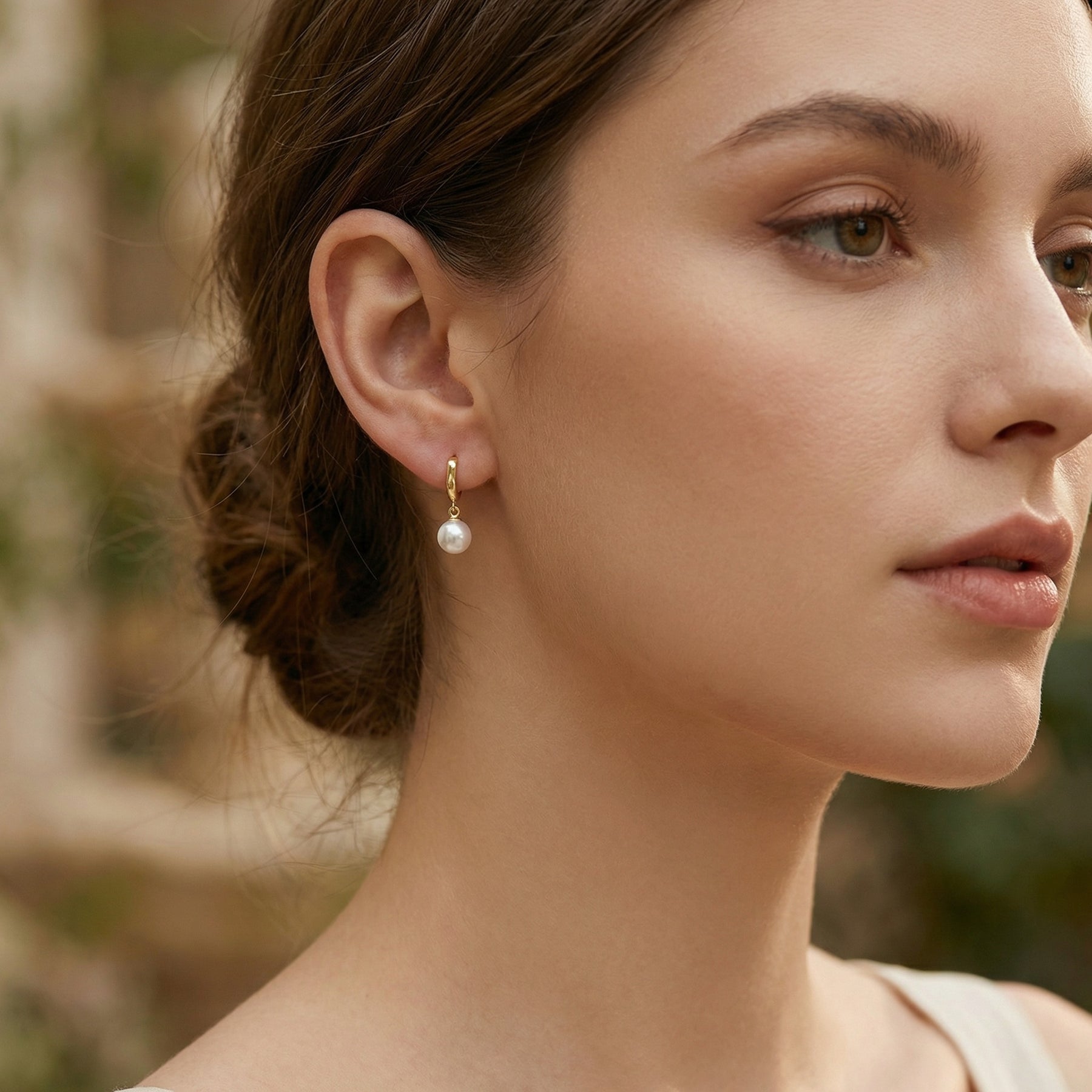 Wavy Huggie Hoops with Pearl Drops – pearl earrings, close-up