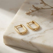 Sleek Rectangular Huggie Hoop Earrings – sterling silver earrings, close-up