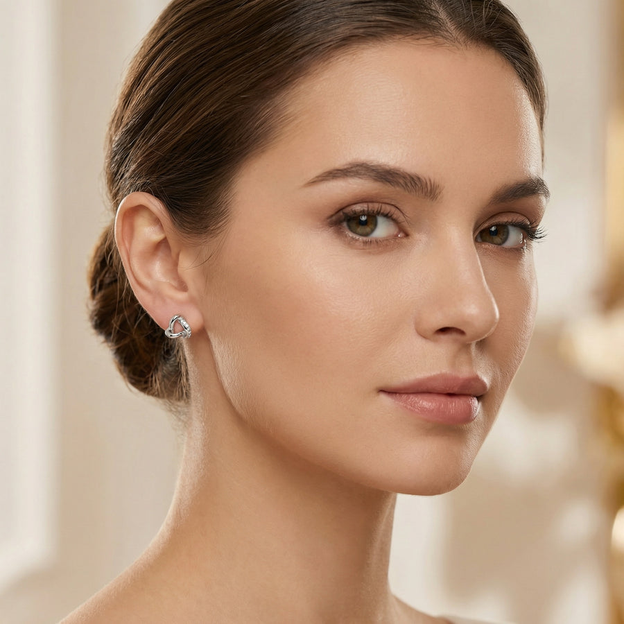 Polished Silver Knot Stud Earrings – sterling silver earrings, front view
