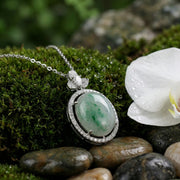 Oval Jadeite Pendant with Floral Bail – jade necklace, side detail