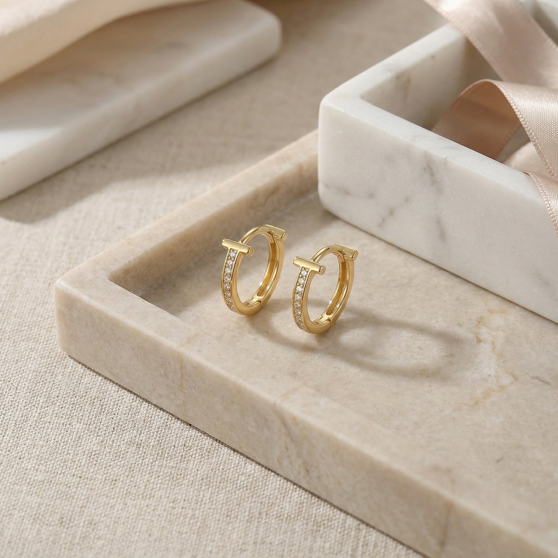 T-Shaped Pavé Huggie Hoop Earrings – sterling silver earrings, front view