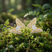 Butterfly Wing Studs with Heart Stones – sterling silver earrings, front view