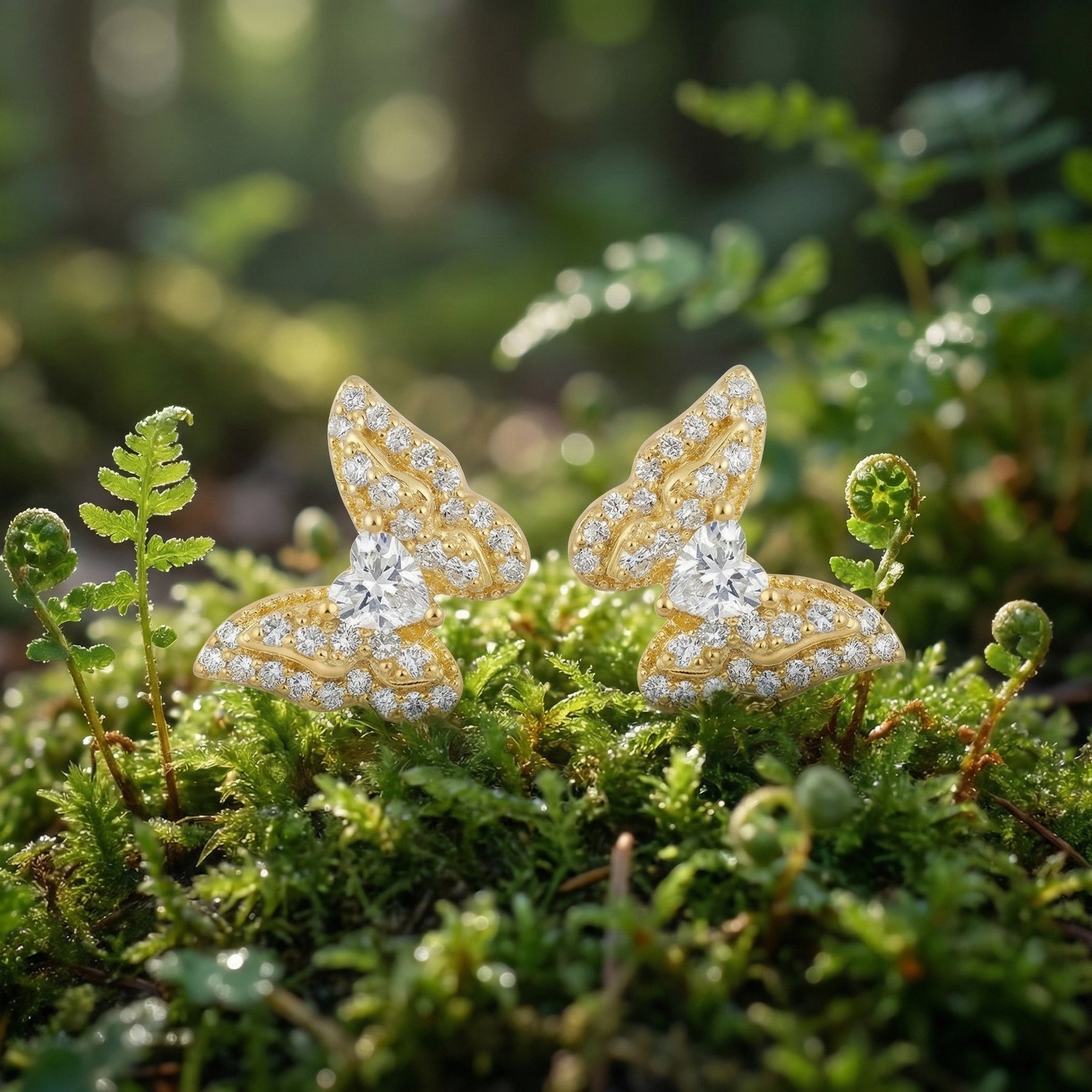 Butterfly Wing Studs with Heart Stones – sterling silver earrings, front view