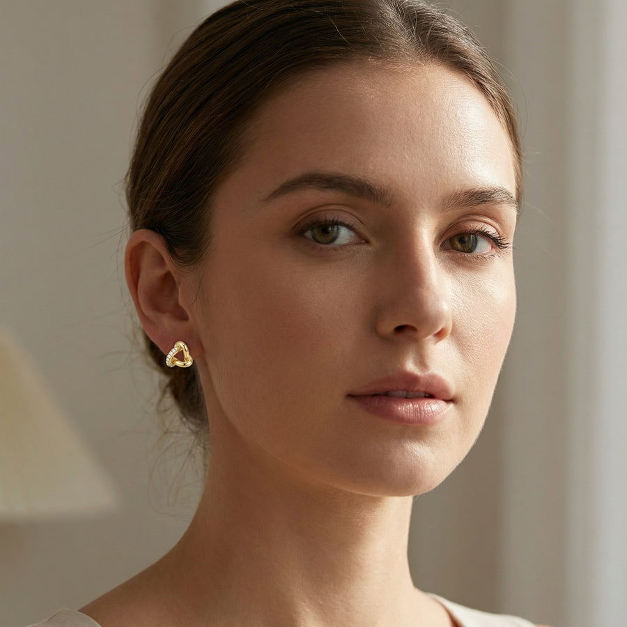 Interlocking Three-Loop Knot Studs – sterling silver earrings, close-up