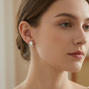 Carved Mother-of-Pearl Rose Studs – mother-of-pearl earrings, front view