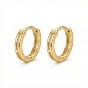 Geometric Cutout Huggie Earrings – sterling silver earrings, close-up