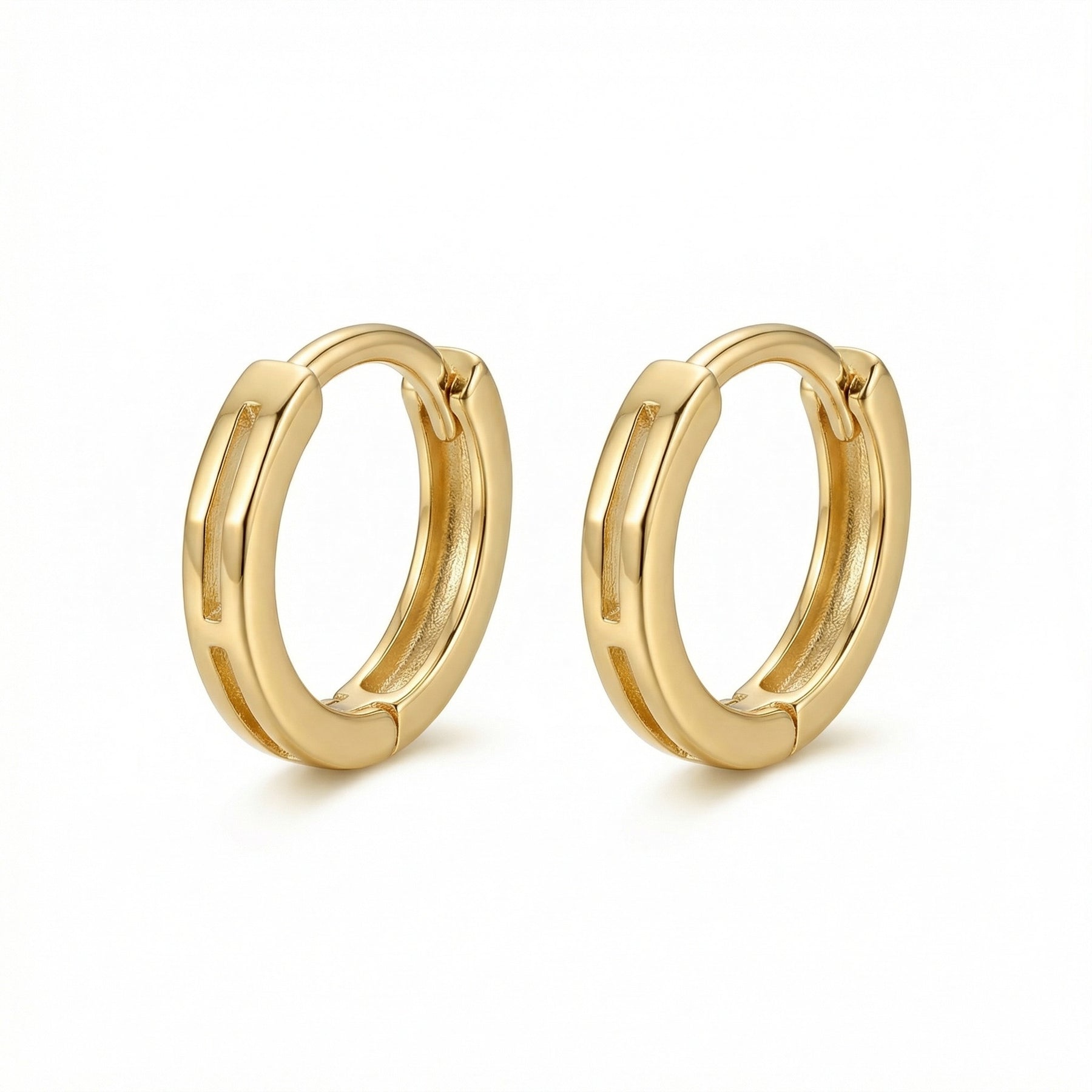 Geometric Cutout Huggie Earrings – sterling silver earrings, close-up
