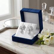 Lily-Inspired Floral Drop Earrings – sterling silver earrings, front view